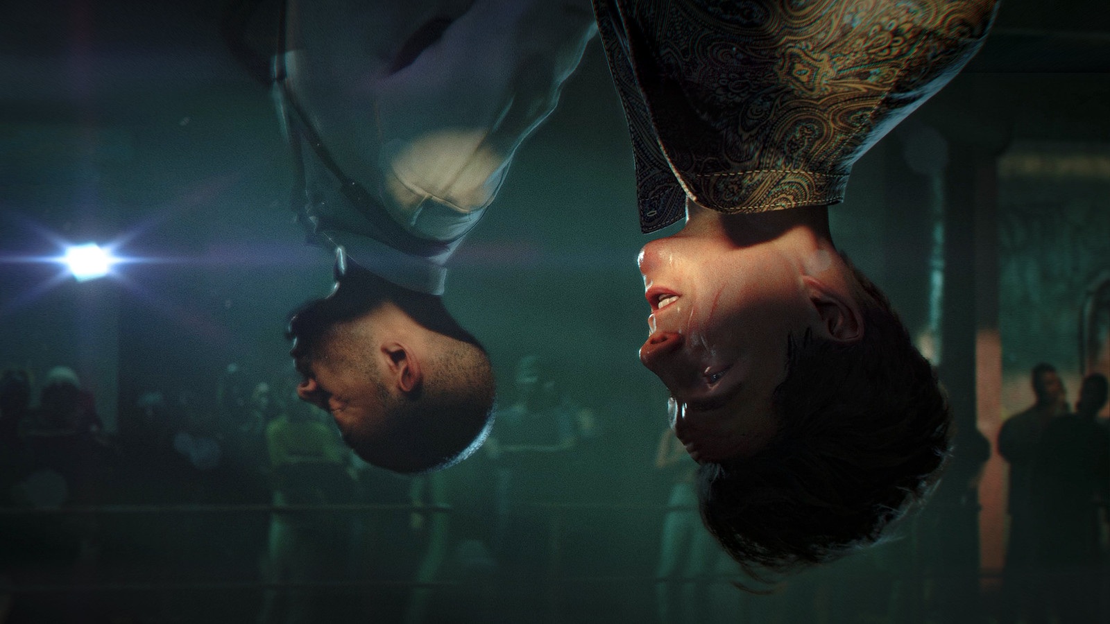 007 First Light screenshot showing two characters upside down in a cinematic scene from the PS5 Pro PSSR showcase